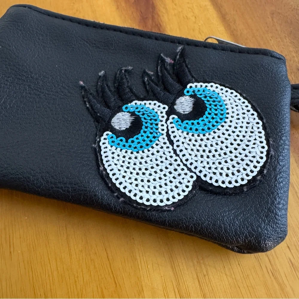 Claire’s black‎ faux leather eyes lashes crossbody